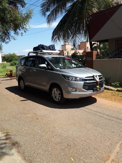 Bookurcab-Cabs & Taxi in Mysore - Outstation Cabs in Mysore Tempo Traveller Rent Mysore business photograph