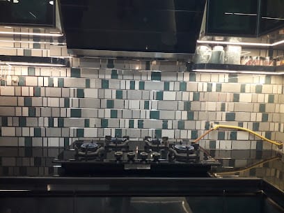 Sushman GASSTOVE and AIRCOOLER repairs and door service business photograph