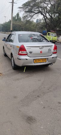 Mysore Taxi Service. Mysore Cab Rental.Mysore Cab Service.Mysore Coorg Taxi .Tempo Traveler Rent In Mysore business photograph