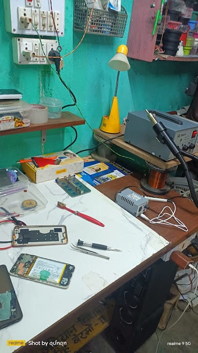 The Phone Fix & Khalid Electricals business photograph