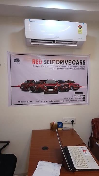 Red Self Drive Car | selfdrive car rental | Innova indore |care hire indore |crysta hire indore |outstation taxi business photograph