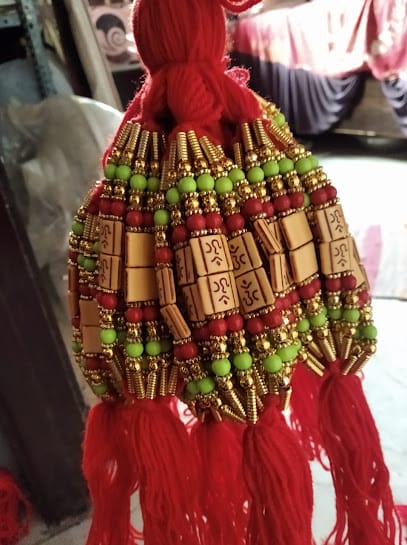 KraftMind- Hair Accessories , Rakhies , Friendship Band , Bracelet , Rubber Bands business photograph