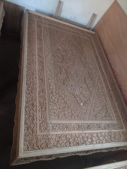 Tariq walnut wood carving furniture manufacturing business photograph