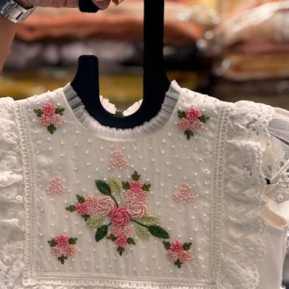 Hera Designs – Baptism Dresses & Aari work & Tailoring in Trivandrum business photograph