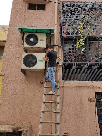 Ac repairing cool point business photograph