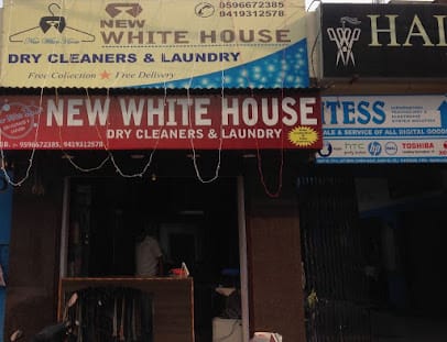 NEW WHITE HOUSE DRY CLEANER business photograph