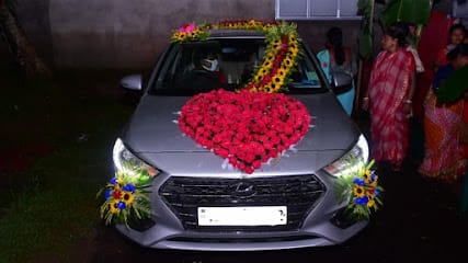 Saha Travels- Car, scooty & Bike Rental Agency-Office,Wedding car provider, Travel Agent- Touriest cars- Cab Rental Service business photograph
