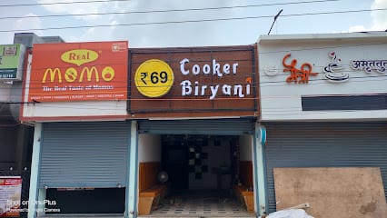 Cooker Biryani @69 business photograph