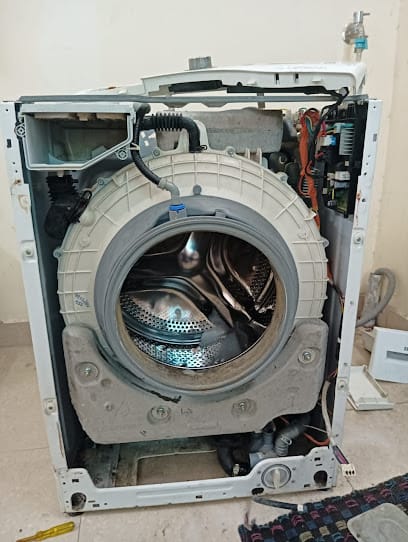 The Cool Tech Refrigerator Washing machine Ac services business photograph