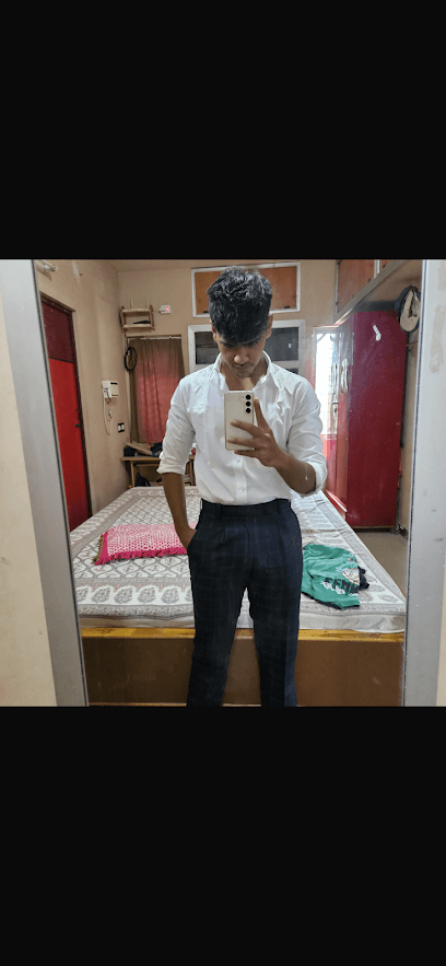 Designers Tailor's & Readymade business photograph