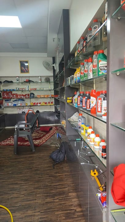 Morya Two Wheeler service centre business photograph