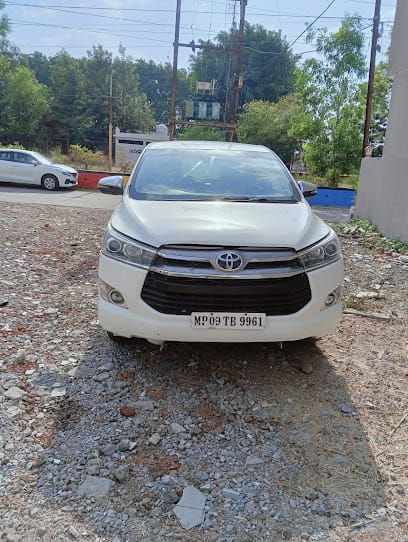 Dharvika Travels | Taxi service In Indore | Car rental indore | Innova crysta rental in indore business photograph
