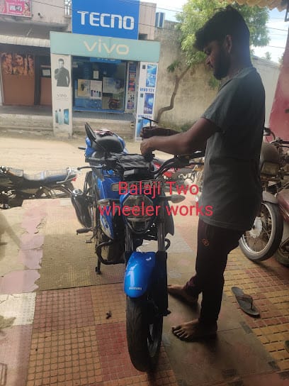 Balaji Two wheeler works business photograph