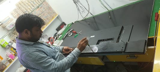 Tv Repairing Center (Asit Mondal). business photograph
