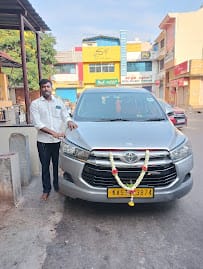 SM TOURS AND TRAVEL - Taxi, Cab Services ,Travels In Mysore business photograph