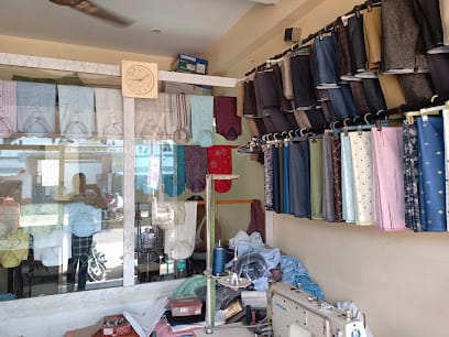 Zaki's designer stitching business photograph