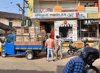 Digital World / UNIQUE MOBILES business photograph