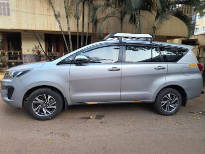 New Hampi Taxi And Car Rentals business photograph