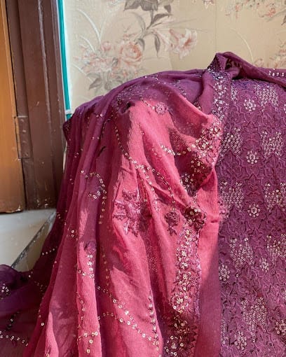 Khan Collection- Pakistani Suits business photograph