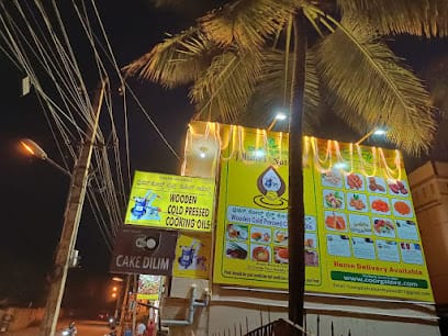 Dhatri Naturals-Cold pressed cooking oil business photograph