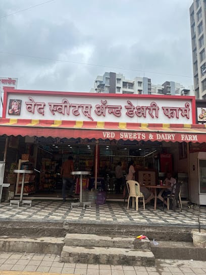 Ved sweets & Dairy Farm business photograph