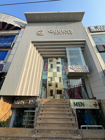 Queen's Couture | Best Bridal Store in Punjab | Luxury Bridal Lehenga, Gown for Wedding, Party Wear Saree business photograph