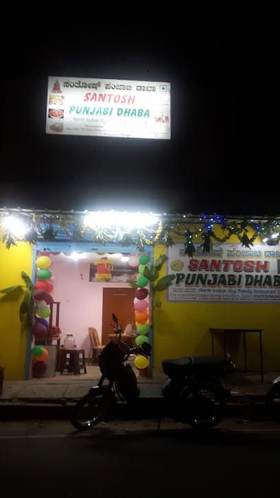 SANTOSH PUNJABI DHABA {pure Veg} business photograph