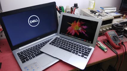 Elsaddai Computer business photograph