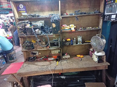 Aman repair shop business photograph