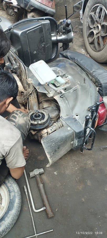 Alam aslam Bike repair business photograph