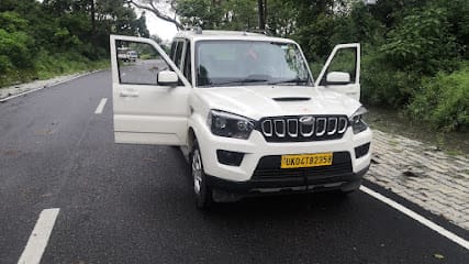 M cars Car rental service- Self Drive Cars In Dehradun business photograph