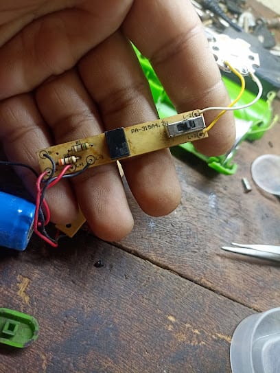 Toshi electronic & repairing service business photograph