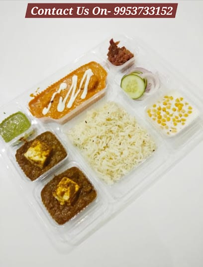 The Foodie Paradise Tiffin Service business photograph