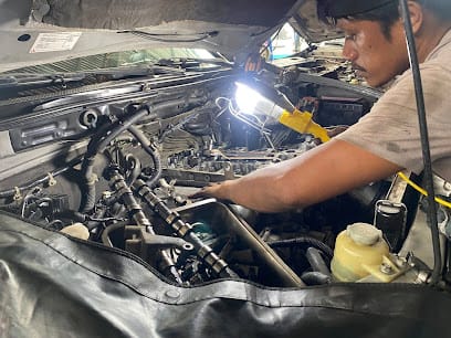 NM MOTORS MULTI Car services | Doorstep Car Repair Service in Hyderabad | Nearby Car Repair Service in Hyderabad business photograph