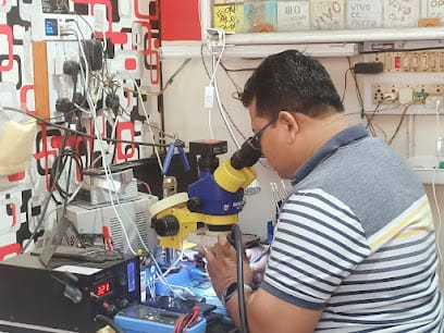 Deepak Mobile Care business photograph