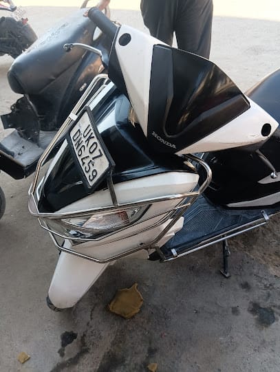 Garhwal Auto service centre business photograph