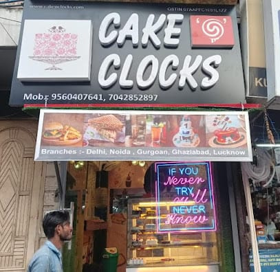 Cake'O'Clocks business photograph