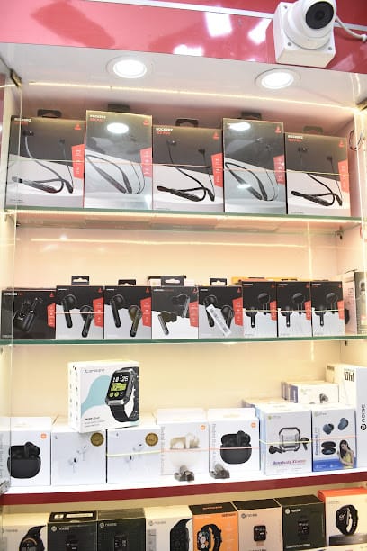 Mobile fashion and repairing centre, Sakuntala road, Agartala business photograph