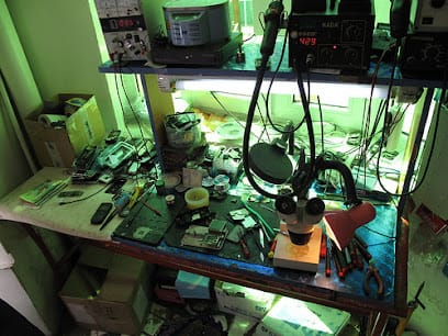 Abdullah mobile repairing hardware and software business photograph