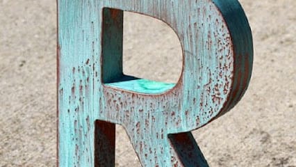 R. A. A. WOOD CARVING business photograph