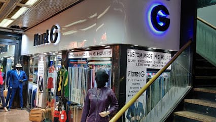 Planet G /Suits/Shirts/Trousers/Ethnic Wear/Tailormade Jeans/Leather Jackets business photograph