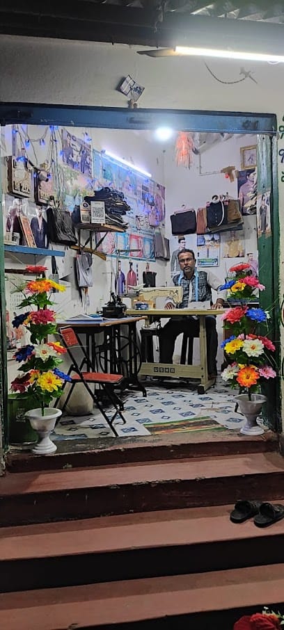 SN Gents and ladies Tailor and kaja Button works business photograph