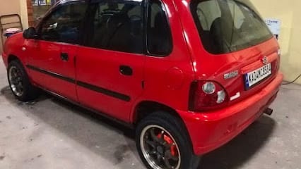 Auto Bell Car Care tinkering and painting business photograph