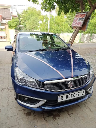 Rainbow Taxi Service | 24 hours Taxi Booking Online । Car Rental | Travel Agency | Can Service in Bharatpur business photograph