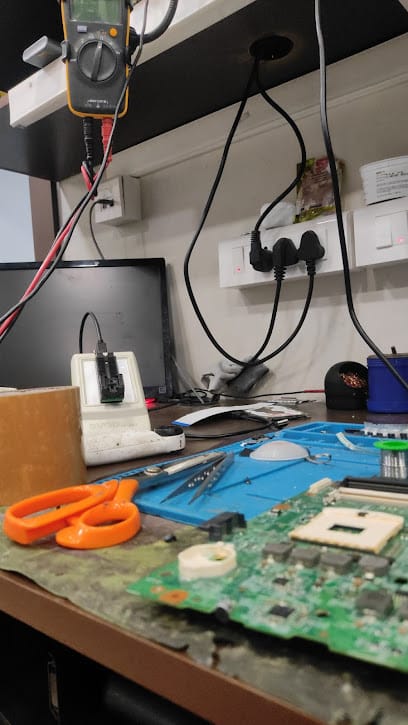 Dev techno advanced laptop chip level service center business photograph