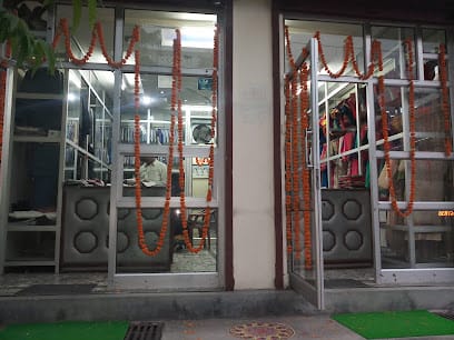 Student Tailors (ladies and gents) and dry cleaners. business photograph