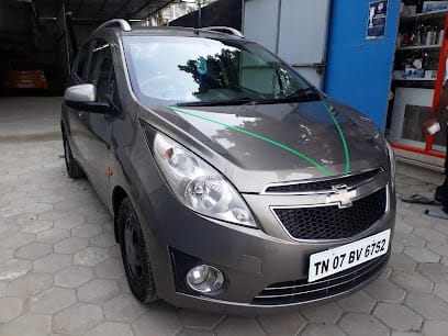 Agriyaa Auto Garage /Multi Brand Car service Centre / Car Detailing / Car Denting Repair service business photograph