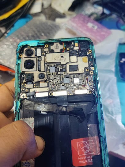 Som Mobile Repairing And Accessories business photograph