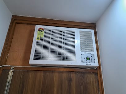 Wecare services - AC repair, Refrigeration. Led tv. washing machine service and installation expert business photograph