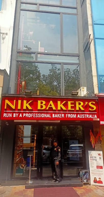 NIK BAKER'S business photograph